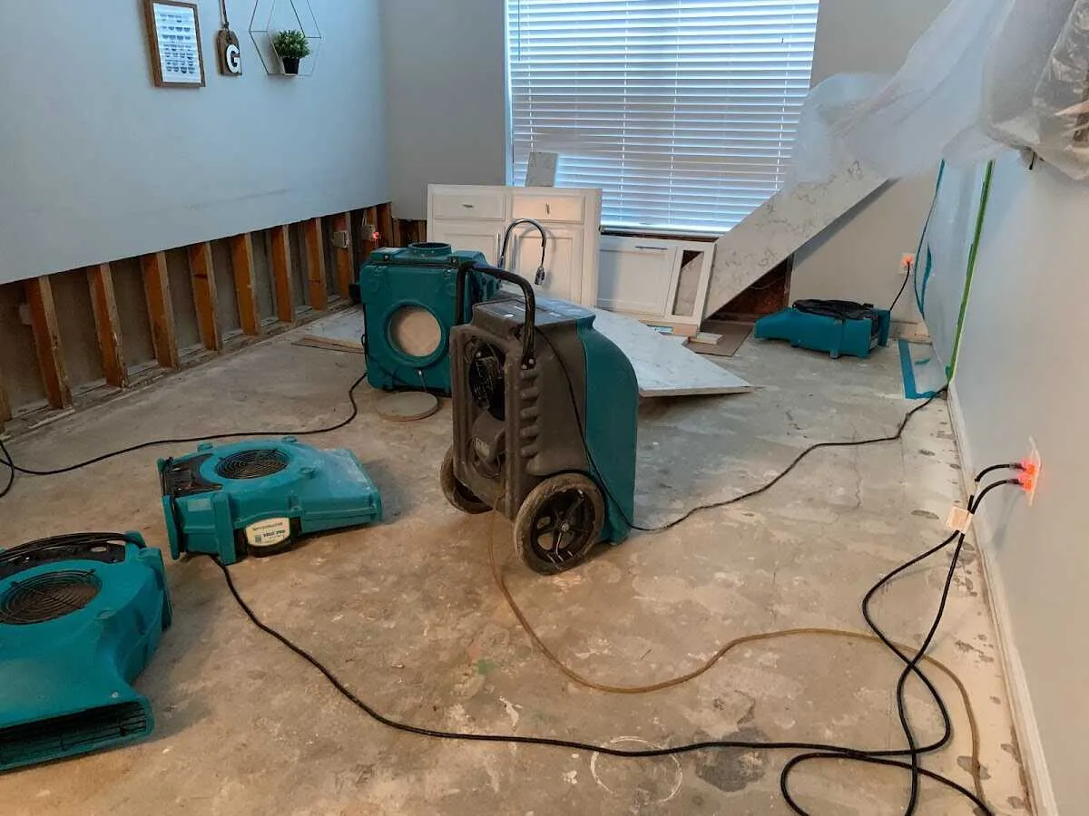 Dehumidifier in flood-cut room for Water Damage Restoration in Vero Beach